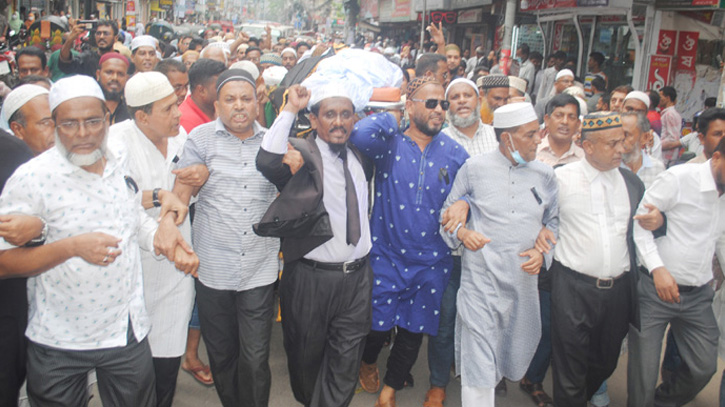 খাঁটিয়ায় বিএনপি নেতার মরদেহ নিয়ে রাস্তায় বিক্ষোভ খাঁটিয়ায় বিএনপি নেতার মরদেহ নিয়ে রাস্তায় বিক্ষোভ