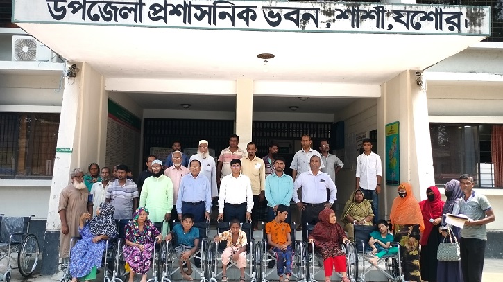 শার্শায় শারীরিক প্রতিবন্ধীদের মাঝে হুইল চেয়ার বিতরণ শার্শায় শারীরিক প্রতিবন্ধীদের মাঝে হুইল চেয়ার বিতরণ