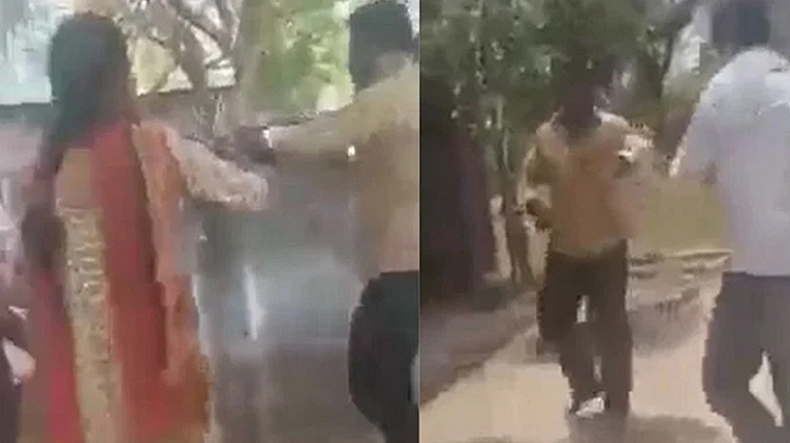 শিক্ষককে মাটিতে ফেলে পেটালেন ছাত্রীর মা-বাবা শিক্ষককে মাটিতে ফেলে পেটালেন ছাত্রীর মা-বাবা