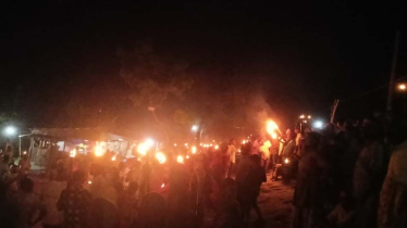 তিস্তাপাড়ে হাজারো মানুষের মশাল প্রজ্বলন