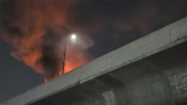 এয়ারপোর্টের সামনে ফ্লাইওভারের উপরে মোটরসাইকেলে আগুন