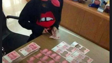 খেলার ছলে টাকা থেকে সব ছবি কেটে ফেললো শিশু, বাবা-মায়ের মাথায় হাত!