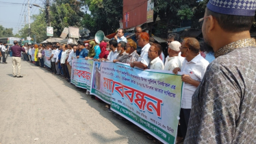 শিক্ষকদের ওপর পুলিশি নির্যাতনের প্রতিবাদে মানববন্ধন