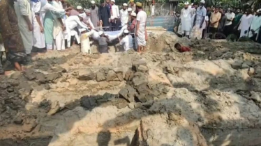 ‘এই প্রথম একসঙ্গে এক পরিবারের নয় জনের কবর খুঁড়লাম’