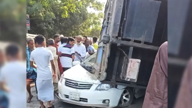 ট্রাক উল্টে পড়ে বিধ্বস্ত প্রাইভেটকার, প্রাণ গেল মা-ছেলের